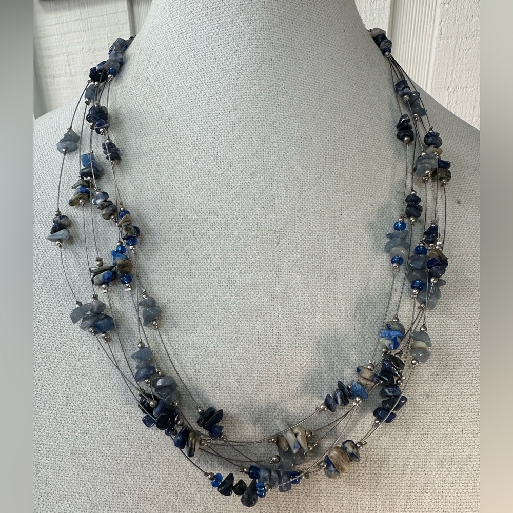 Multi strand infinity style necklace with lapis chip beads